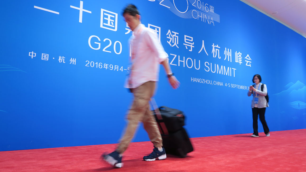 G20峰会新闻中心:那些匆匆的身影